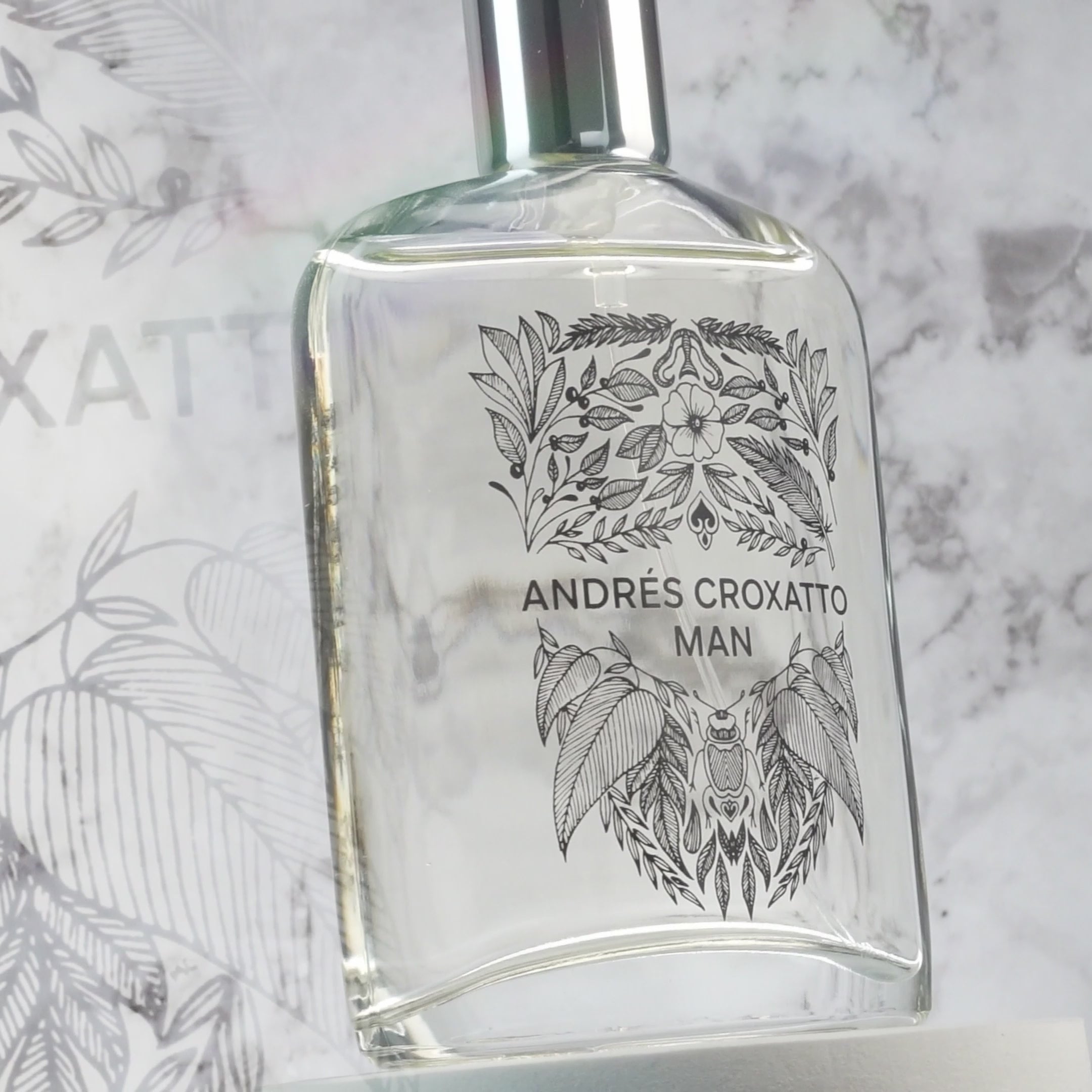 Botella y caja del perfume de Andrés Croxatto